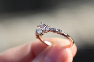 crescent moon three stone with 8x4mm marquise lab diamond