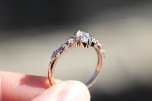 crescent moon three stone with 8x4mm marquise lab diamond