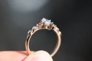 crescent moon three stone with 8x4mm marquise lab diamond