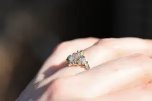 briar moon three stone with 8x5mm pear lab diamond and blue sapphire accents