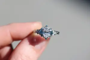 briar rose three stone with .7ct oval lab diamond and aqua diamond