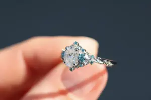 briar rose three stone with .7ct oval lab diamond and aqua diamond