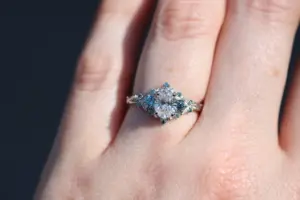 briar rose three stone with .7ct oval lab diamond and aqua diamond