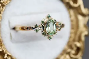briar rose halo moon with 6x4mm oval lab green sapphire